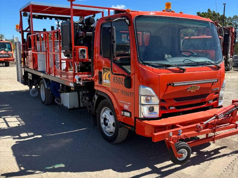 McShea Contracting truck and equipment at work during a large-scale pavement marking project